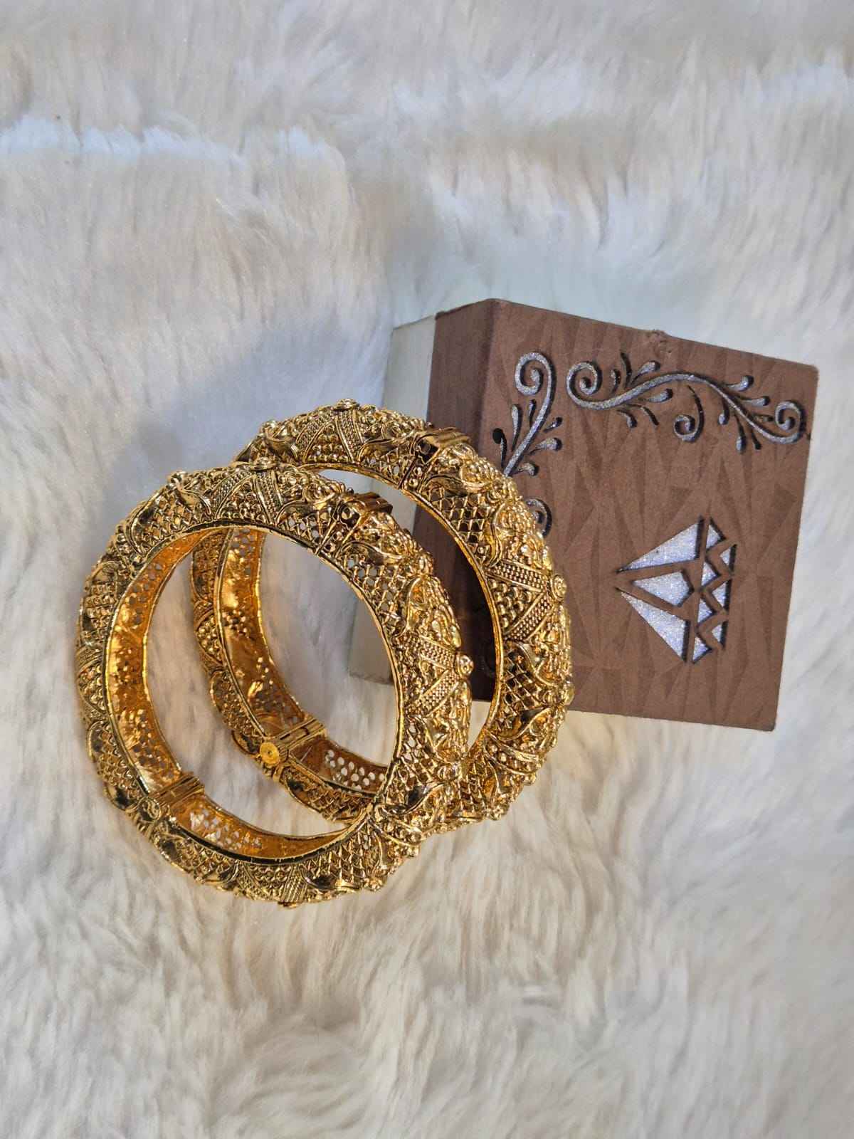 Gold bangles with nakkashi work