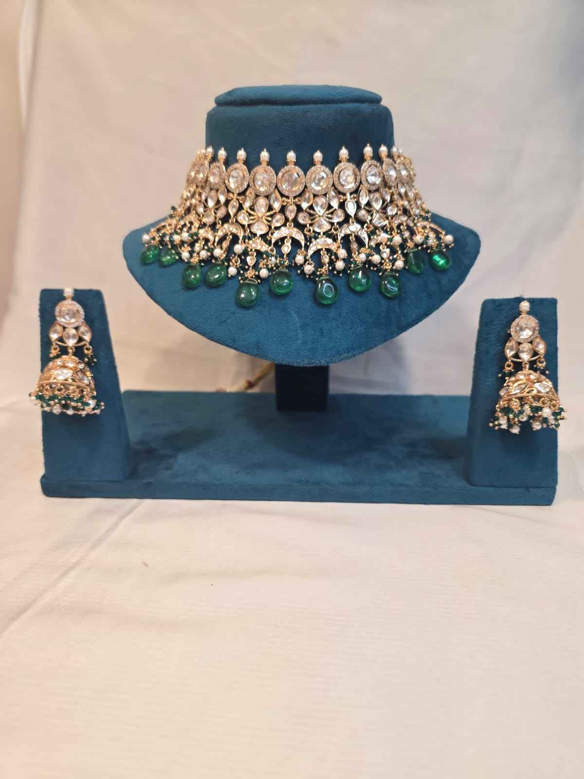 mosinite kundan set with green dublet stone