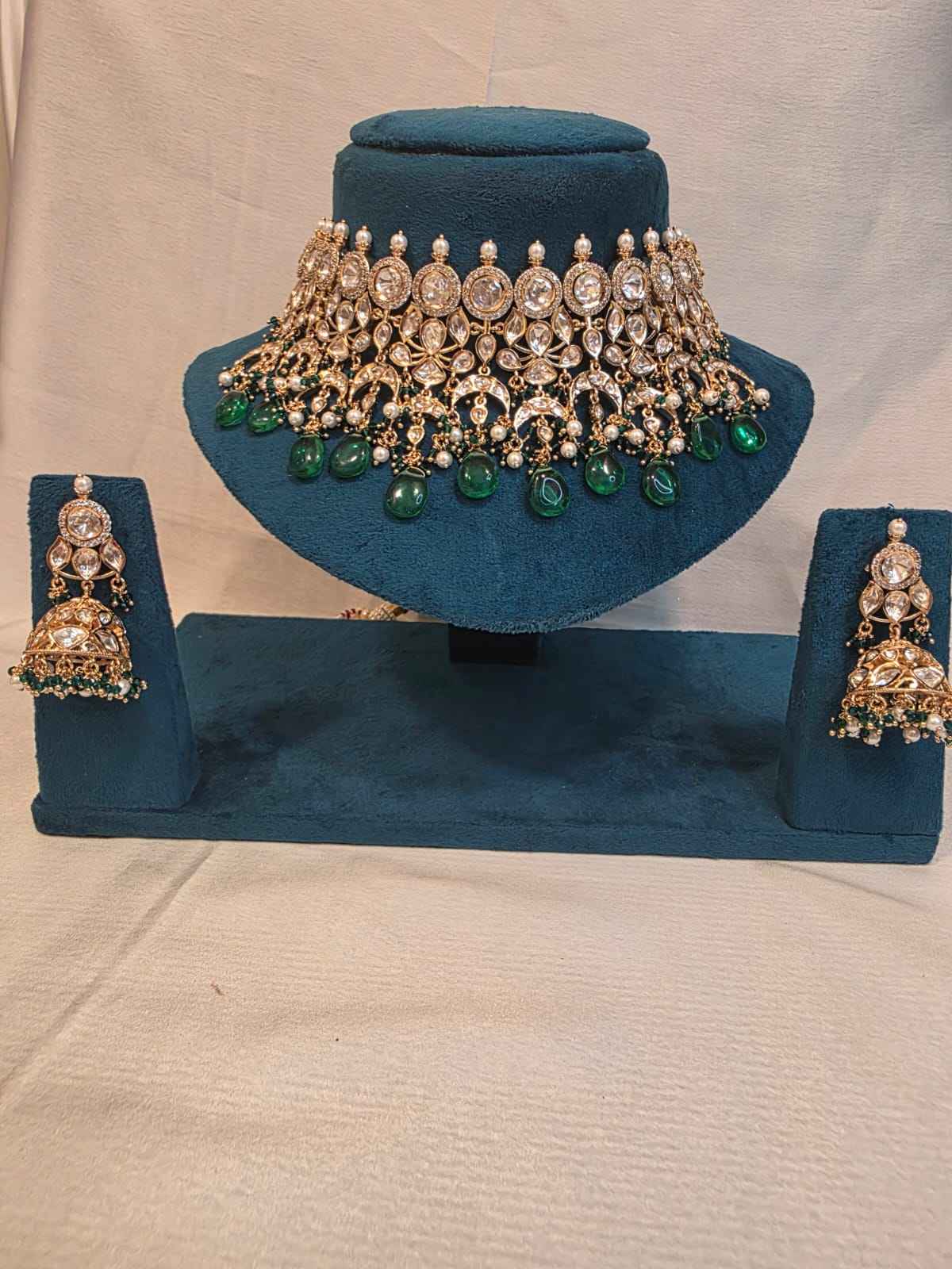 mosinite kundan set with green dublet stone